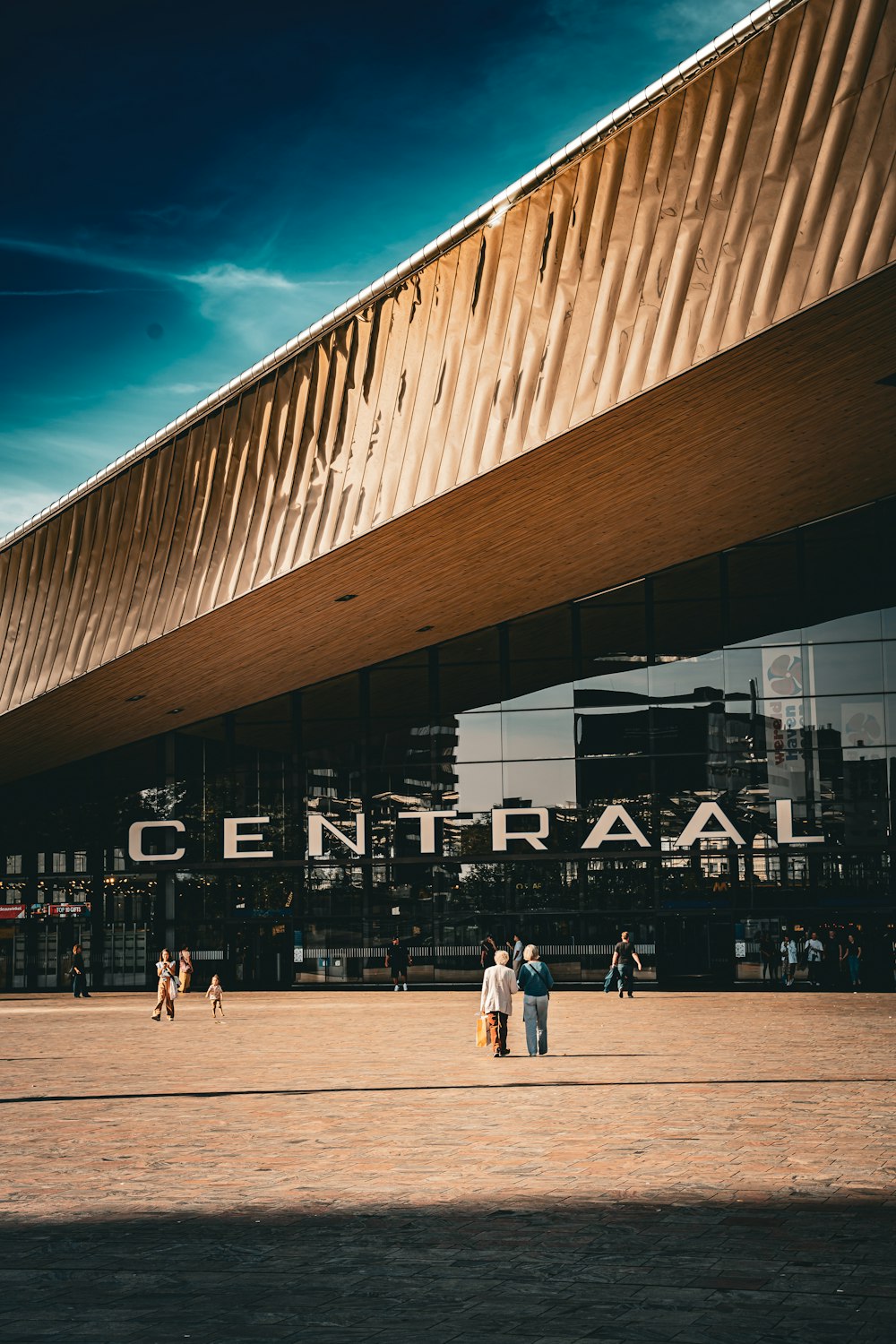 a group of people standing in front of a building