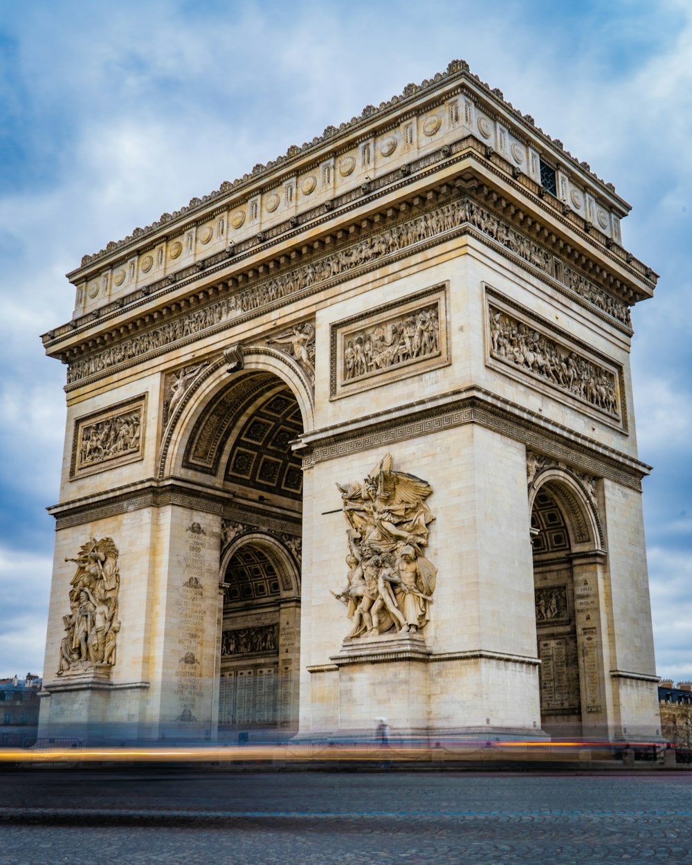 a very tall building with a clock on it's side