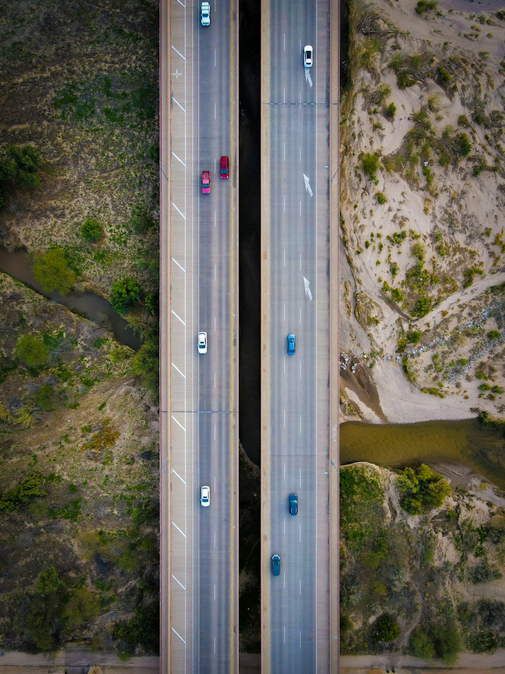 an aerial view of two lanes of a highway