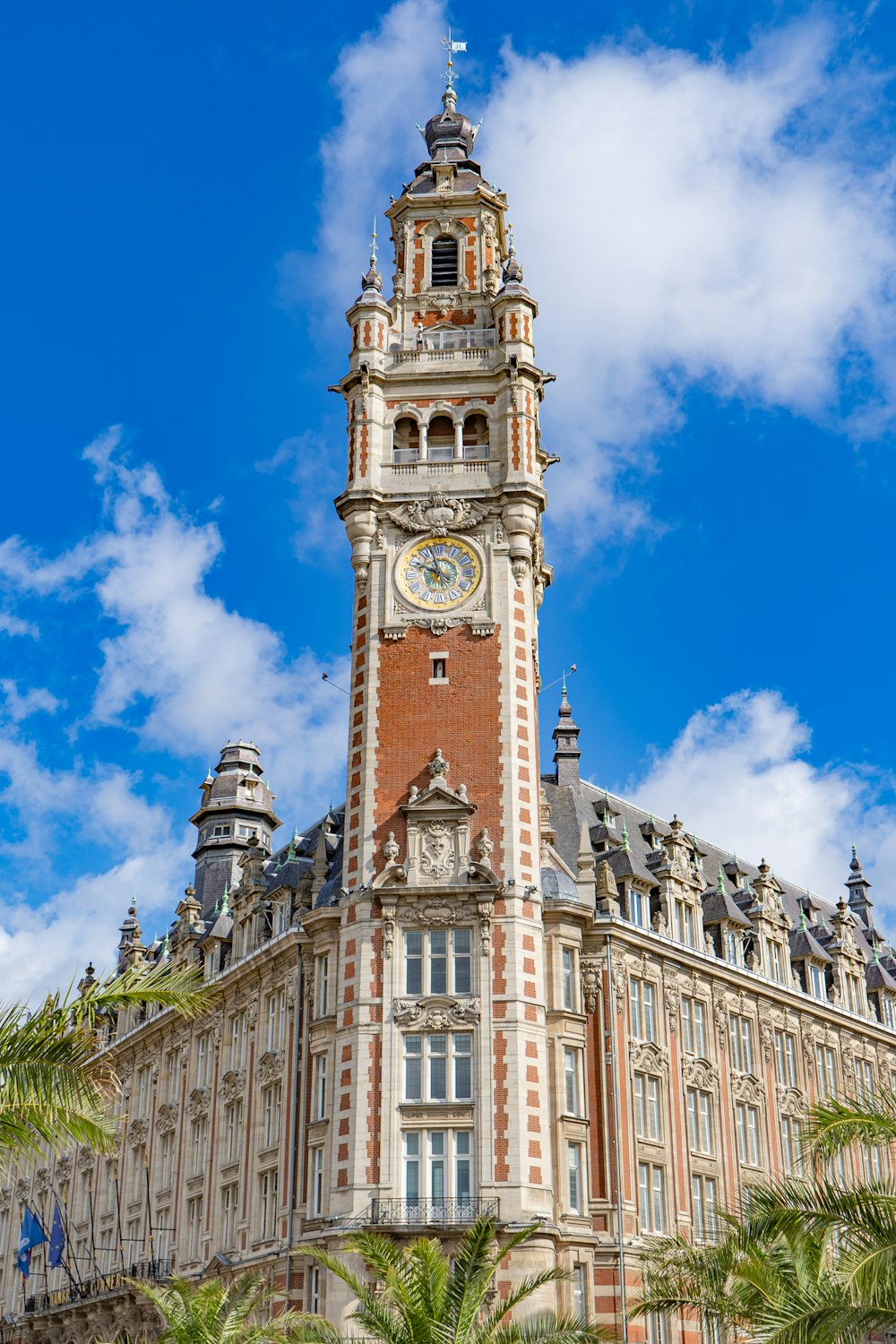 a large building with a clock on the top of it