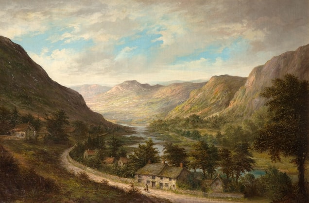 A picturesque landscape featuring a tranquil valley surrounded by towering mountains. A winding road leads to several rustic cottages nestled among lush greenery. The sky above is partly cloudy, with patches of blue visible.