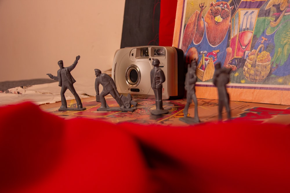a group of toy figurines are on a table