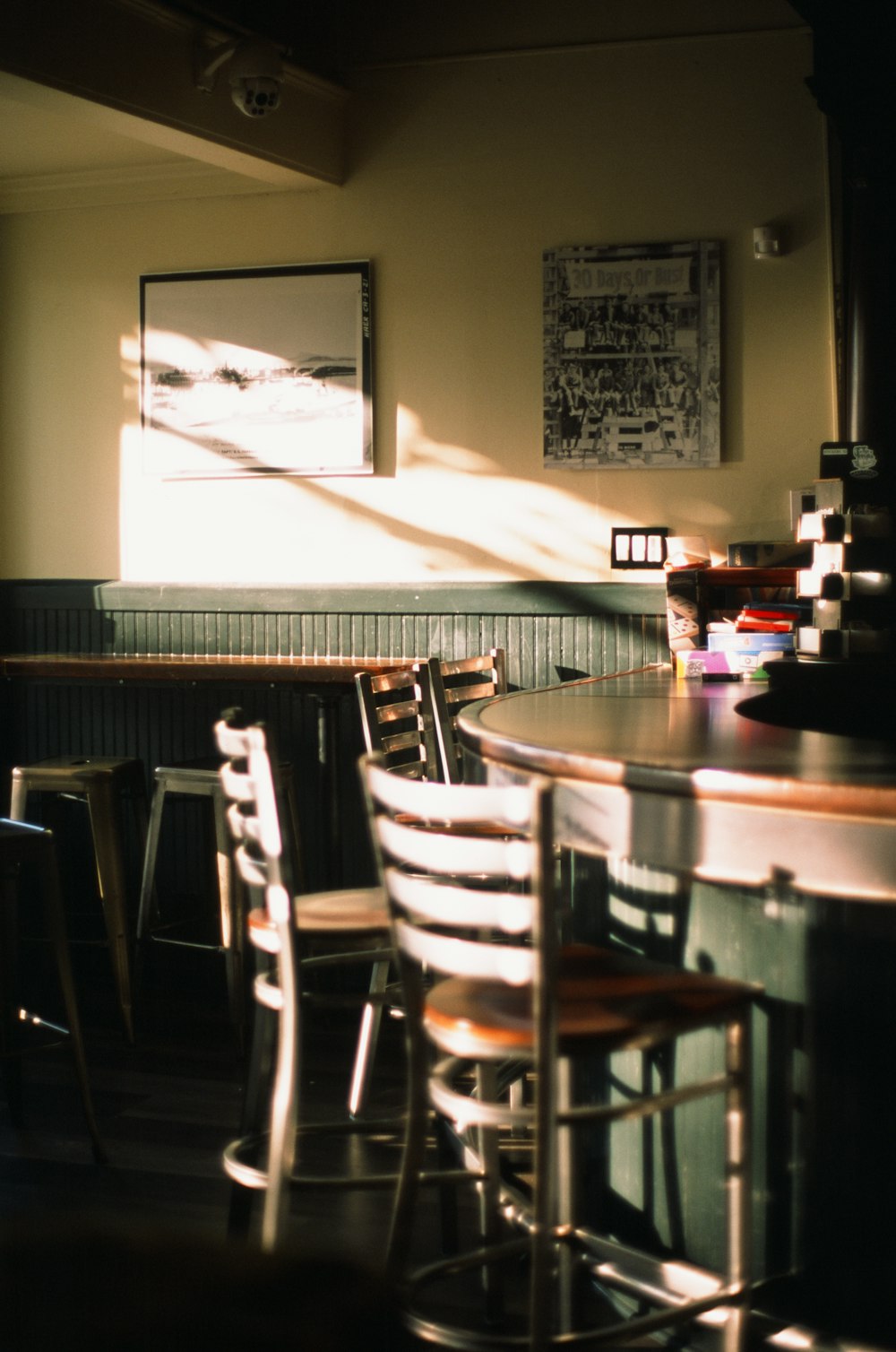 a room with a bunch of chairs and a table