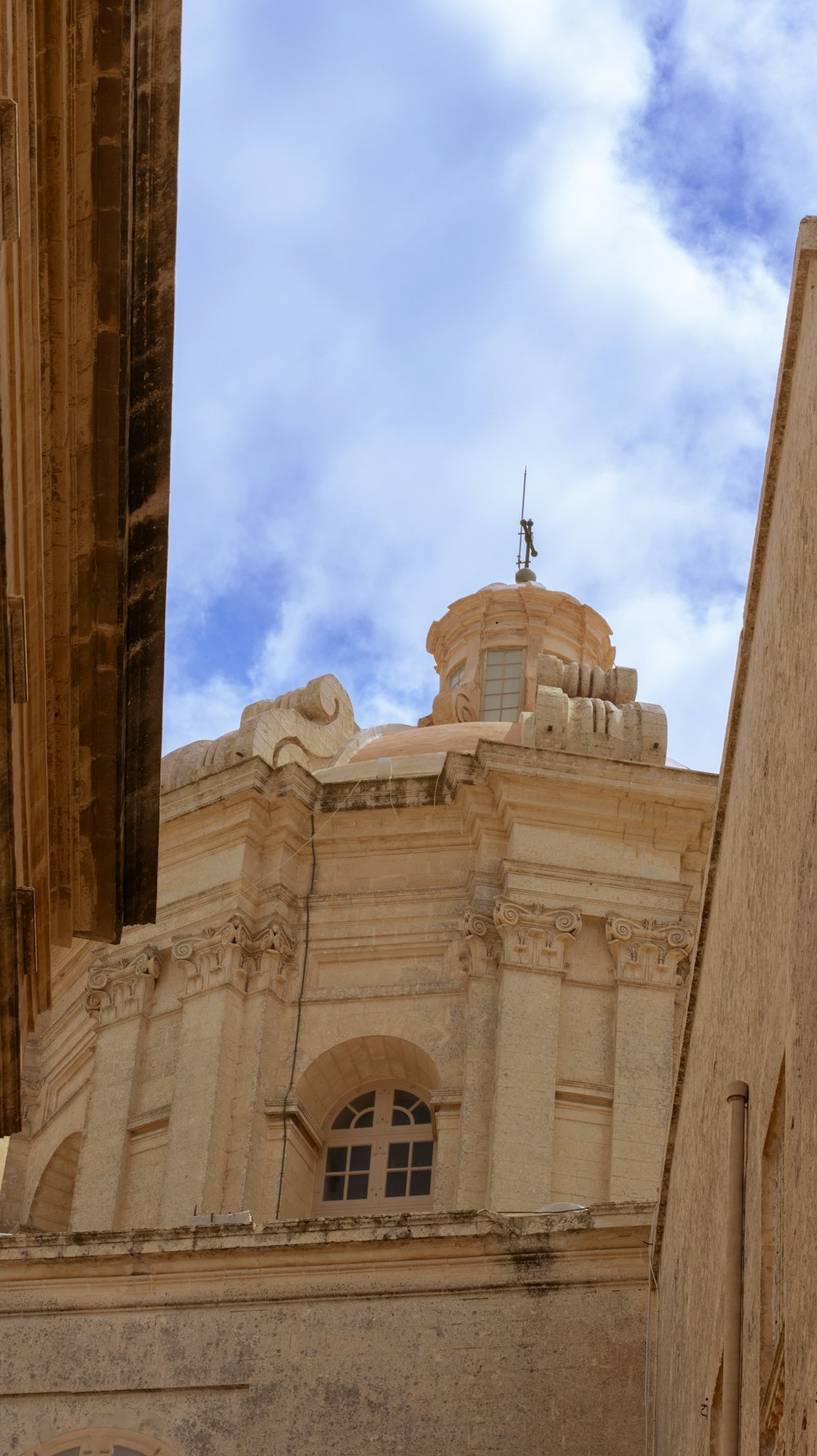 a tall building with a clock on the top of it