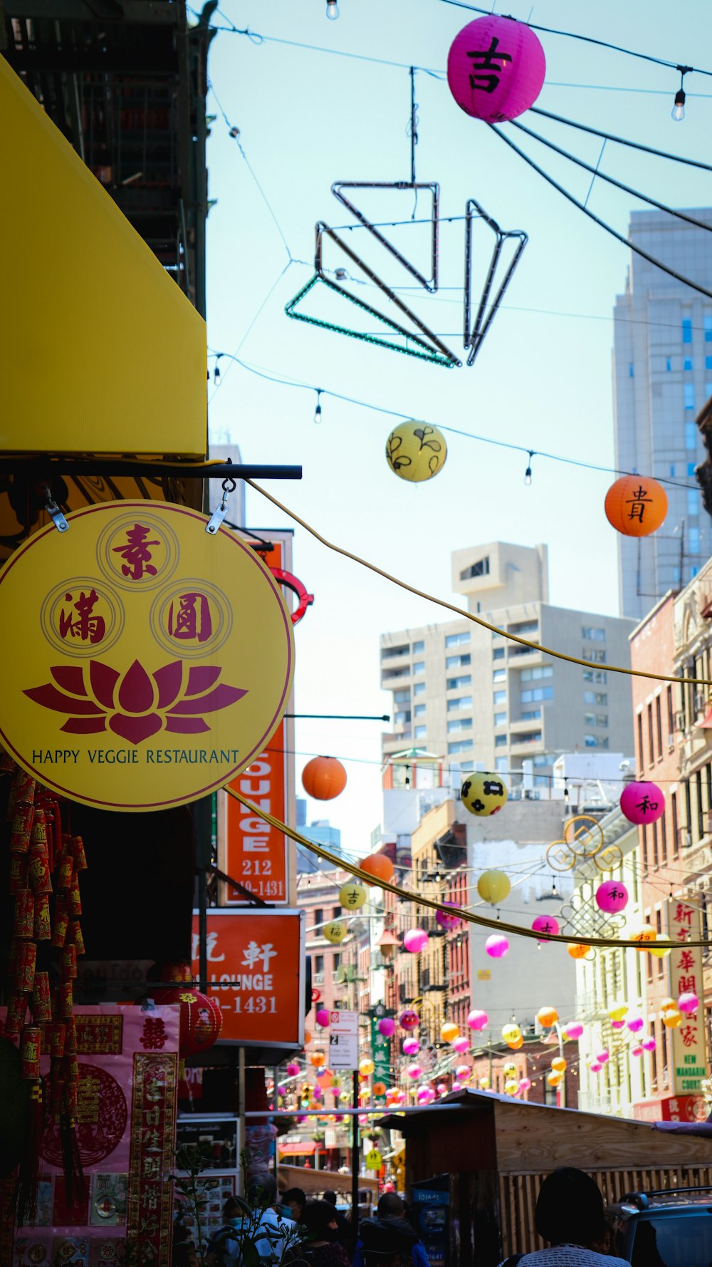 a city street filled with lots of neon lights