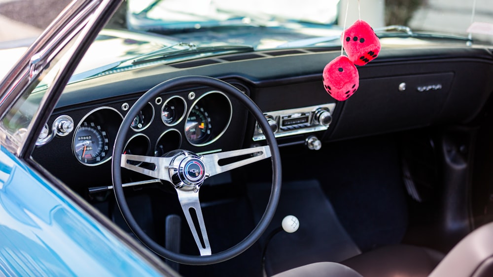 a steering wheel and dashboard of a car