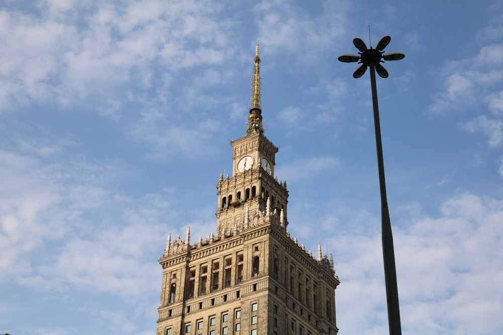 a tall building with a clock on the top of it