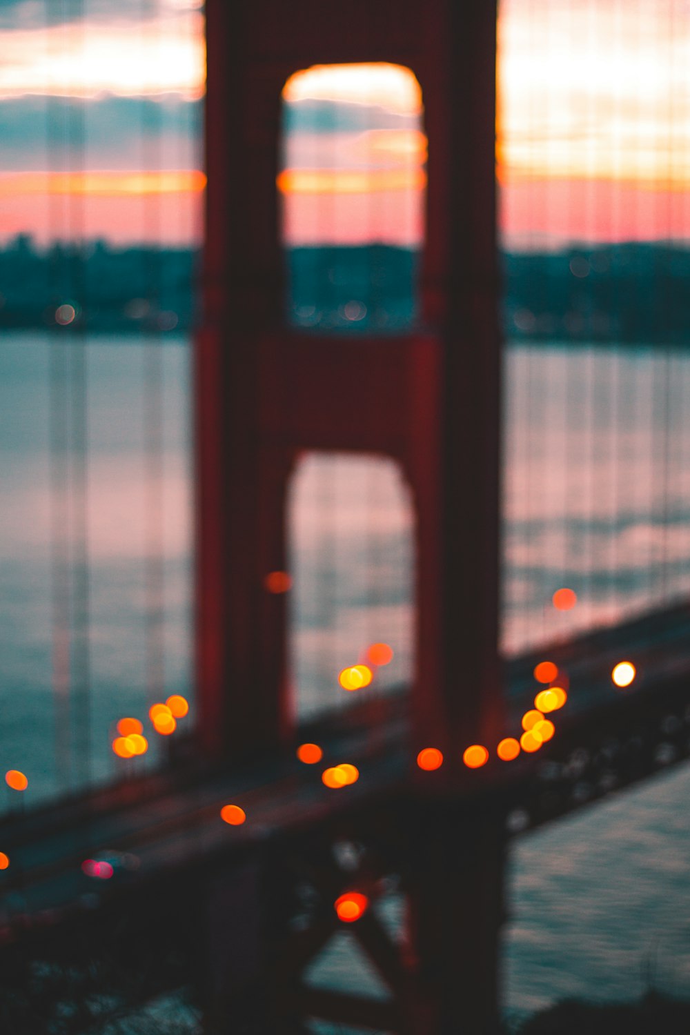 a view of the golden gate bridge at sunset