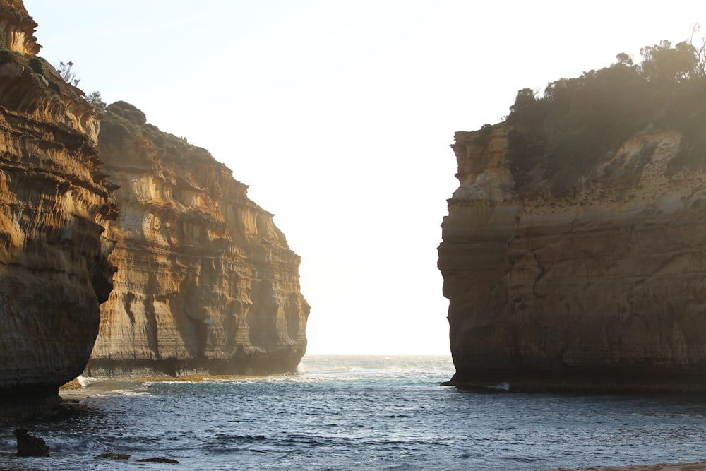 two large rocks sticking out of the ocean