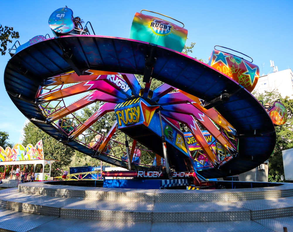 a carnival ride with a colorful design on it