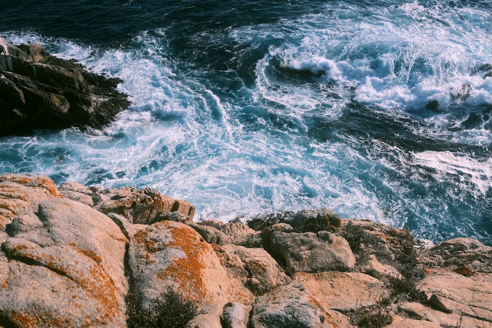 a view of the ocean from the top of a cliff