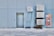 A blue tiled wall with a closed metal door and several air conditioning units mounted above and beside it. Next to the AC units is a red hose cabinet with a fire safety sign.