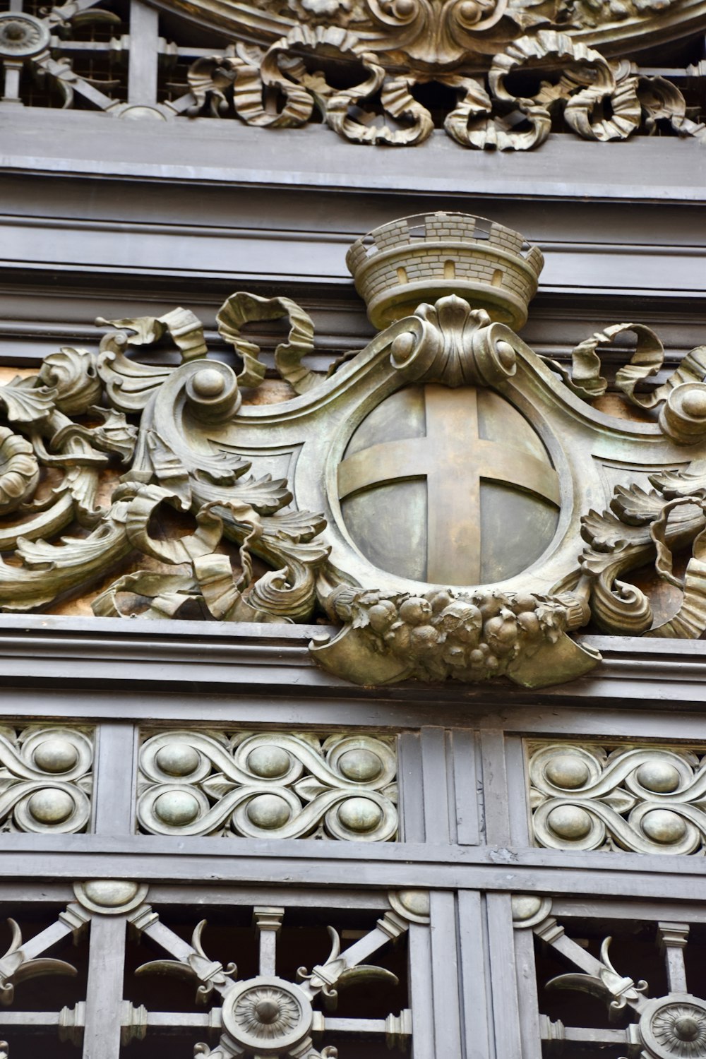 a close up of a metal object on a building