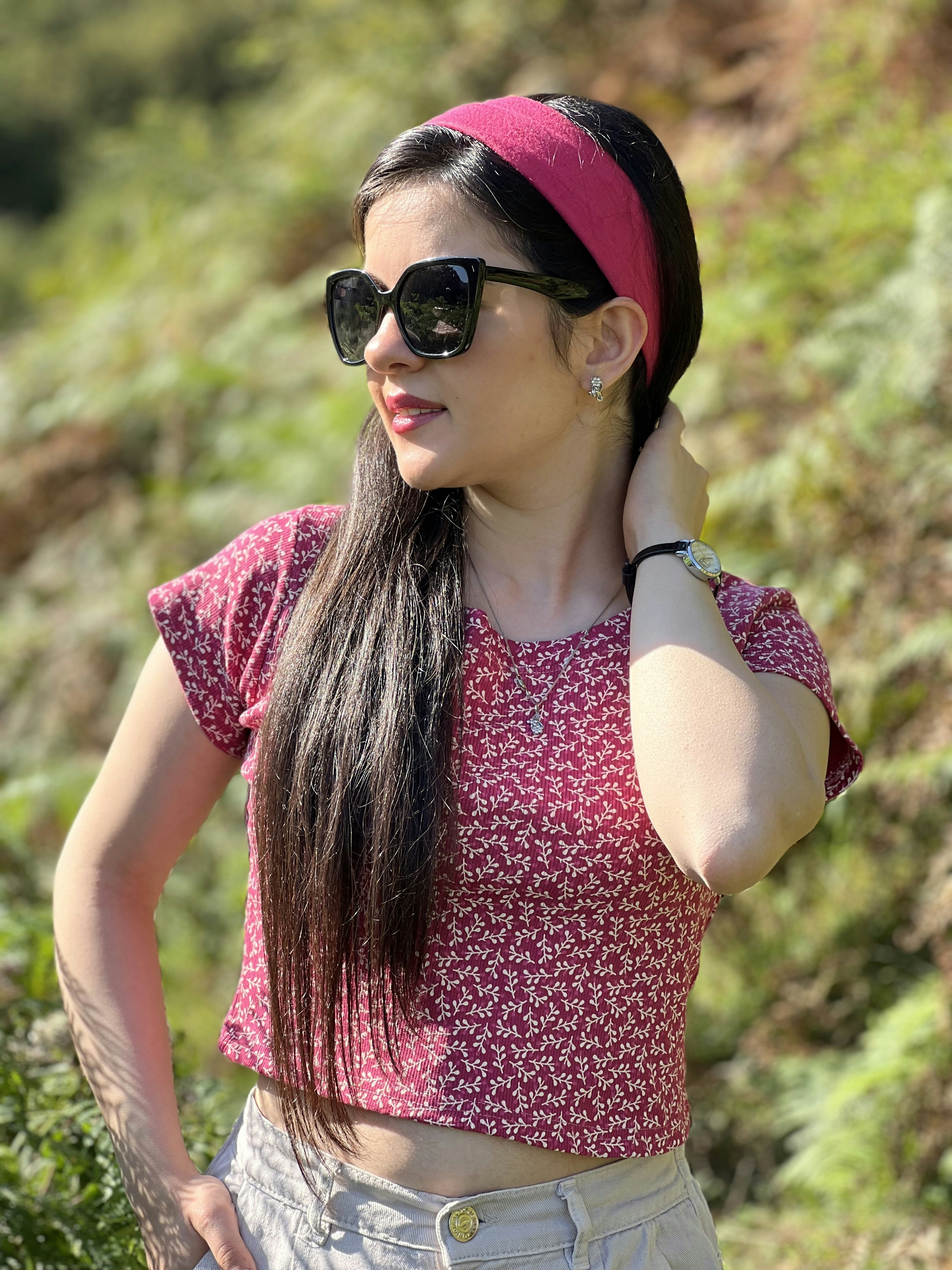 Woman in a flowing casual summer dress in soft natural light, airy bright setting