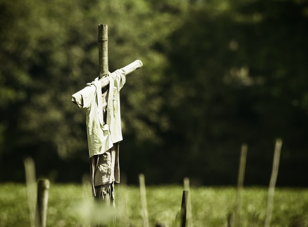 a statue of a person holding a baseball bat