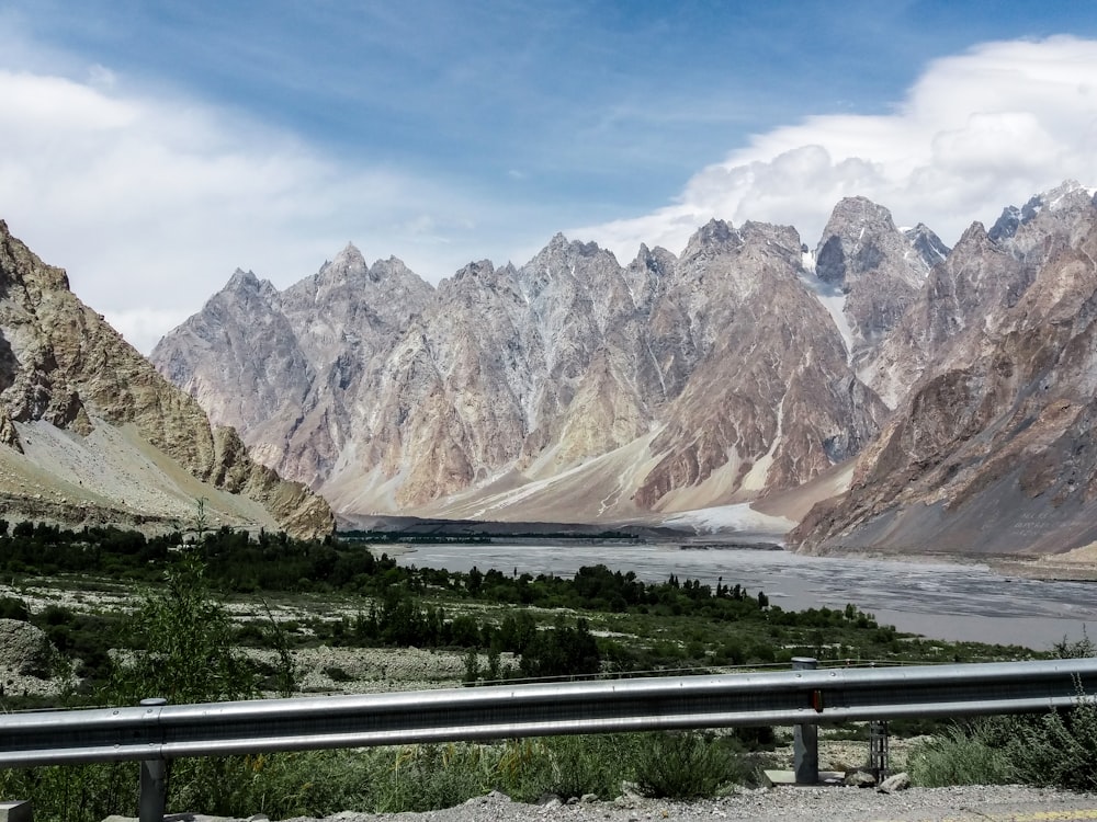 a view of a mountain range from a highway