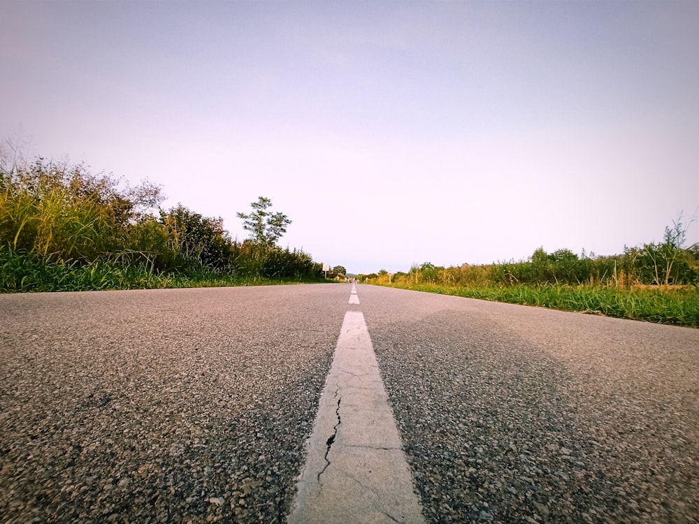 a road with a white line on the side of it