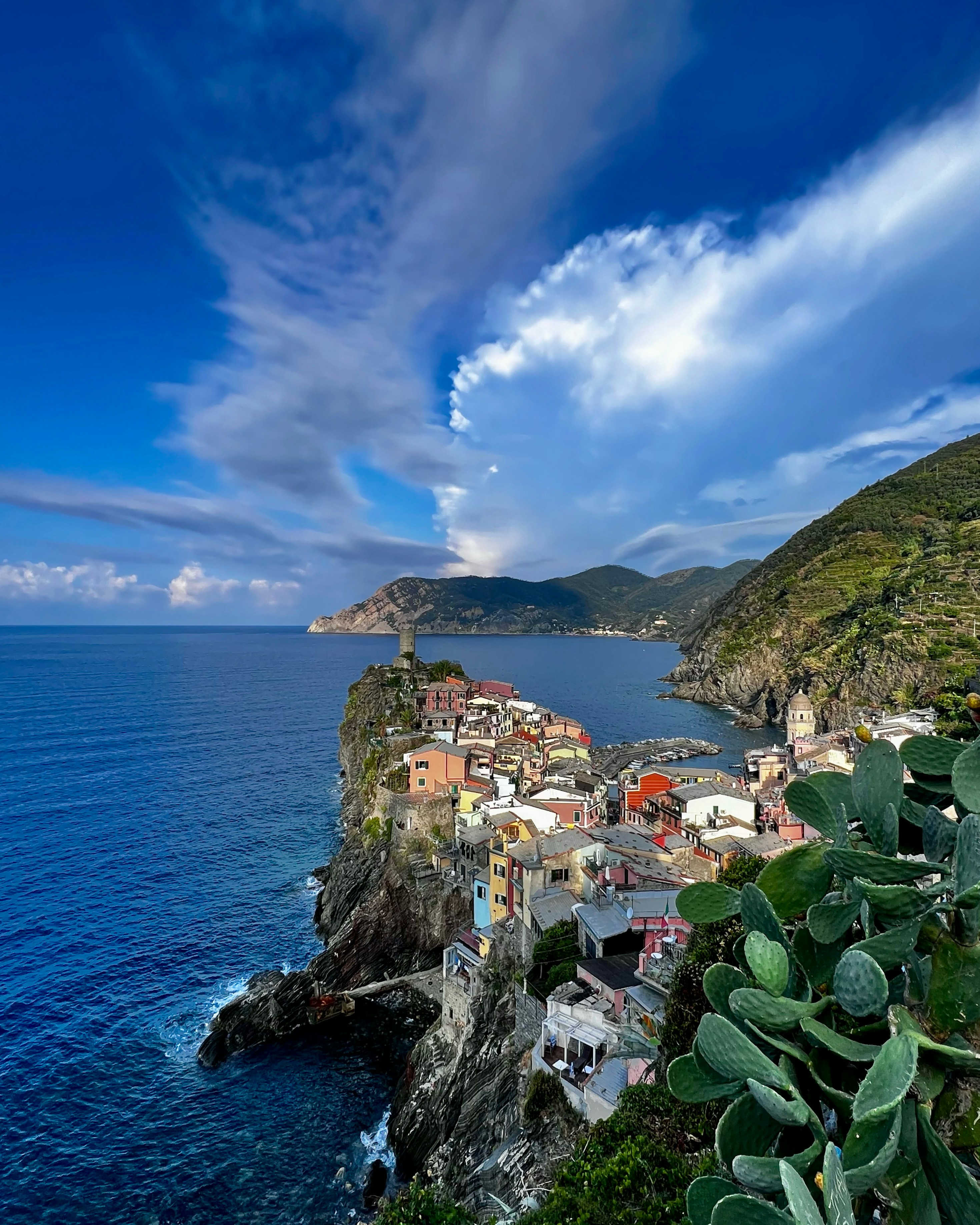 a view of a small town on the edge of a cliff