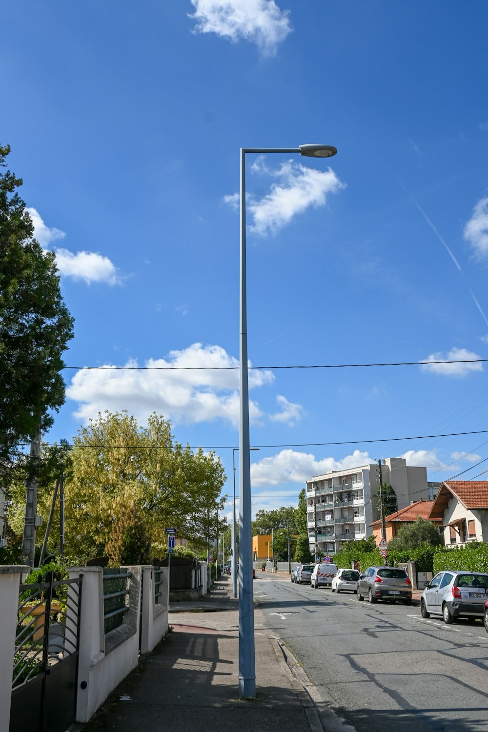 a street light on the side of a road