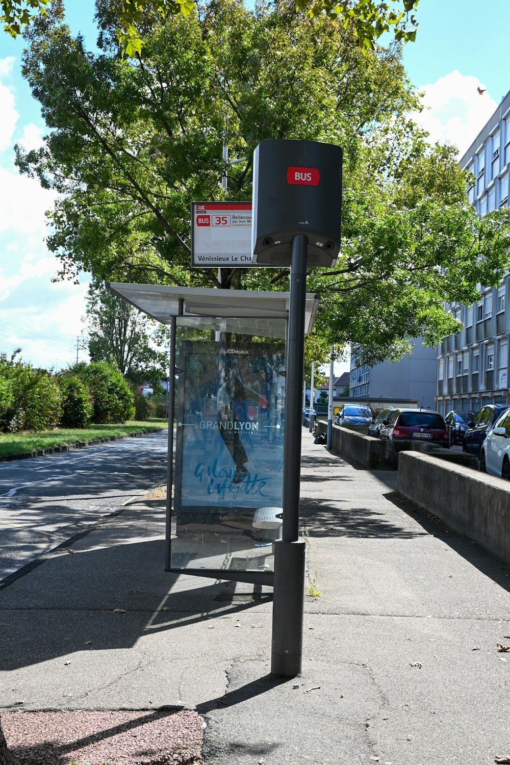 a bus stop on the side of the road