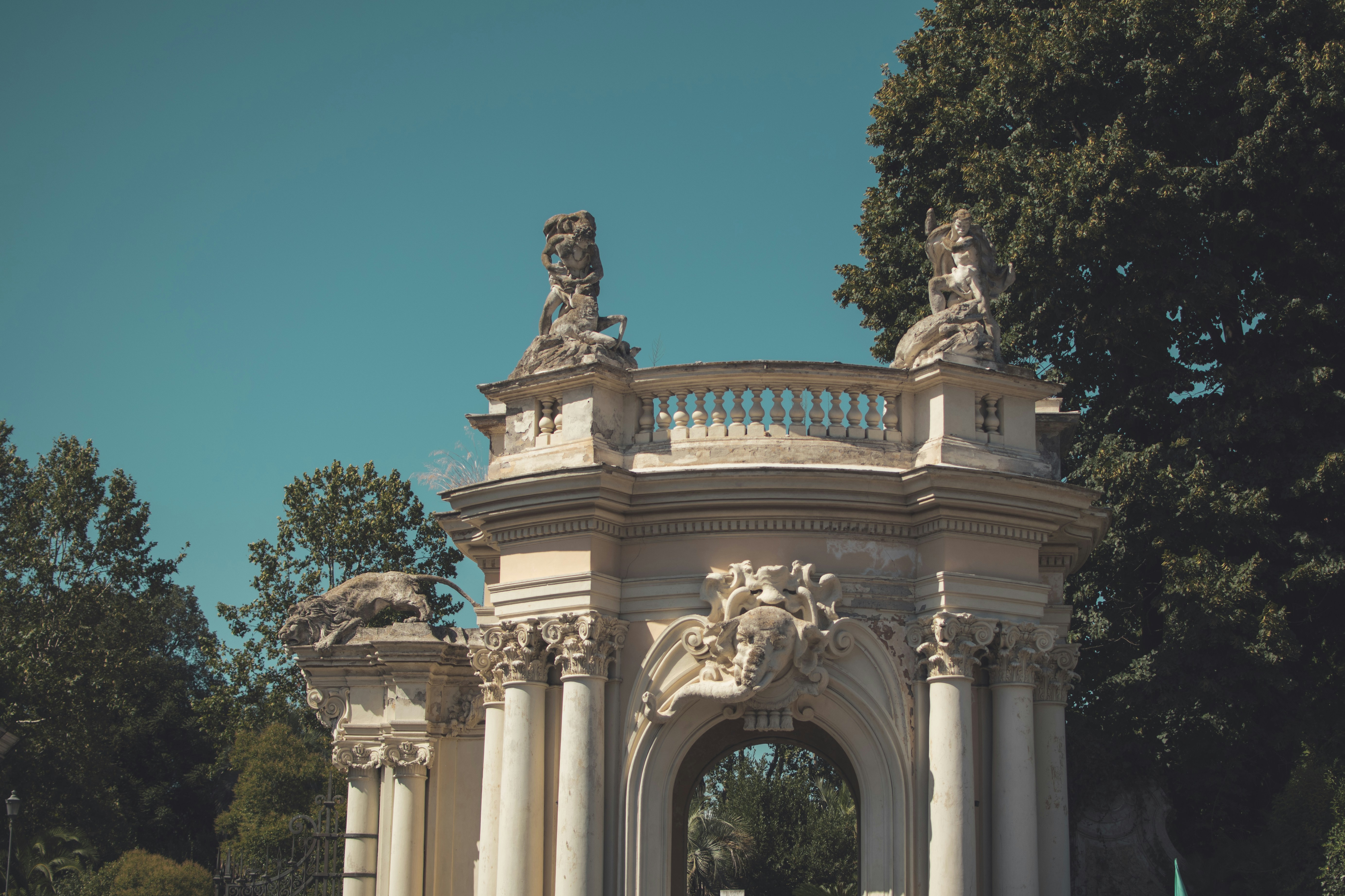 a white arch with statues on top of it, Palazzo Borghese