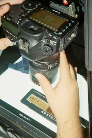 Specialized scanning equipment capturing a frame from an 8 mm film.