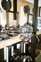 a group of machines sitting on top of a wooden table