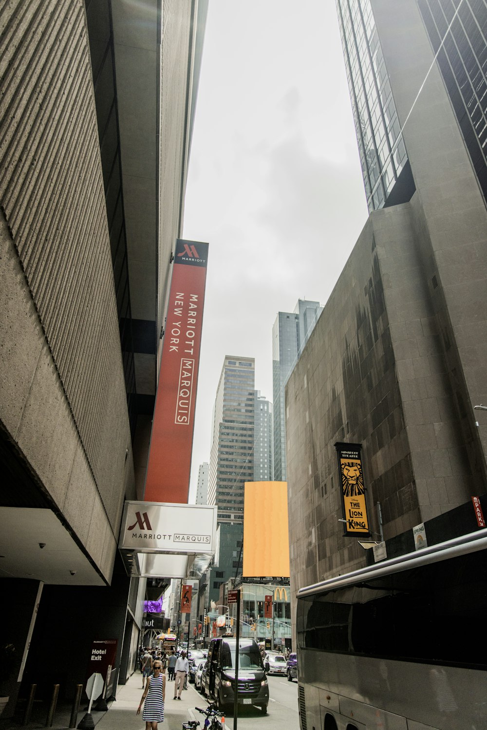 a city street filled with lots of tall buildings