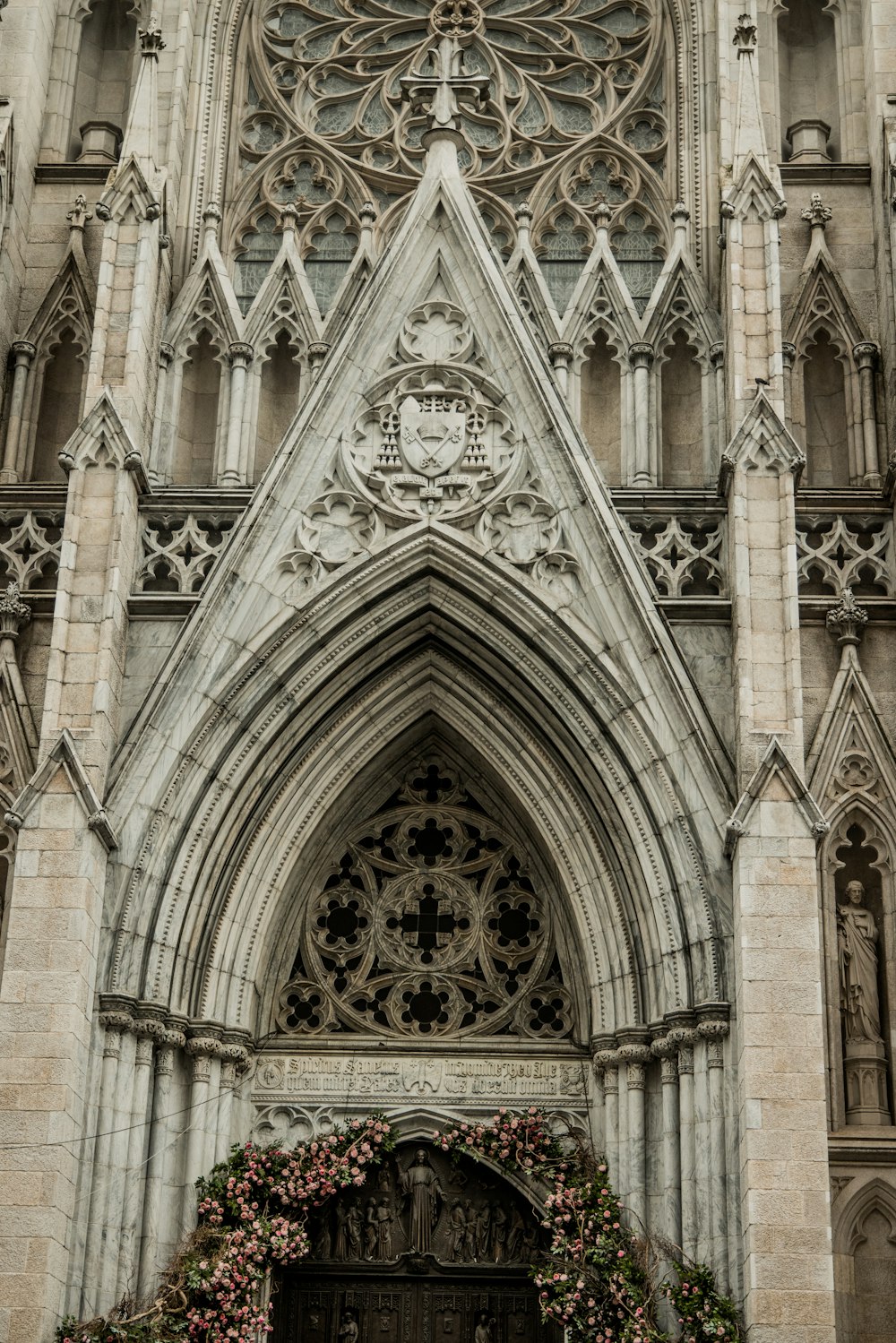 a large cathedral with a clock on the front of it