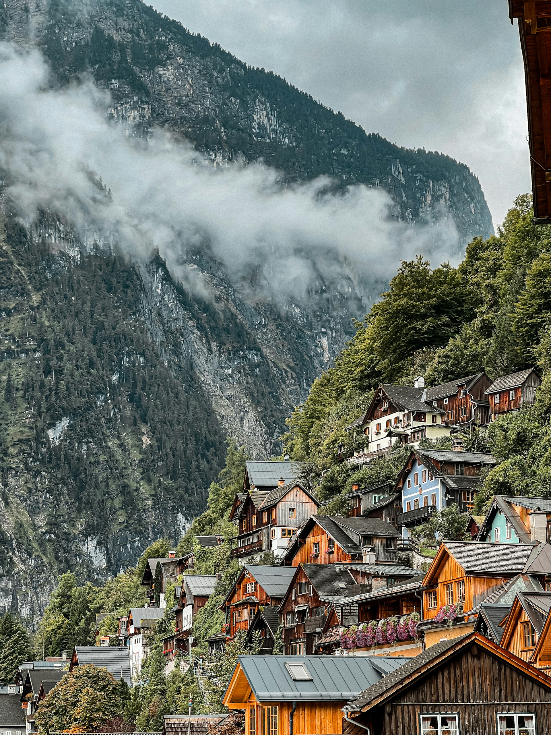 a village with a mountain in the background