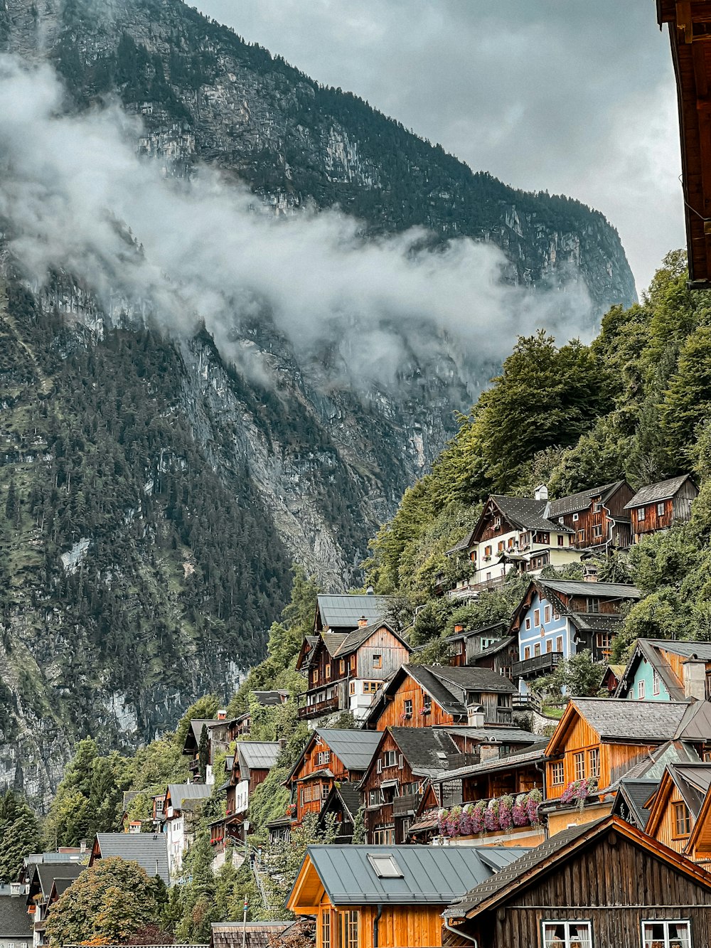 a village with a mountain in the background