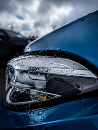 a close up of a car's rear view mirror
