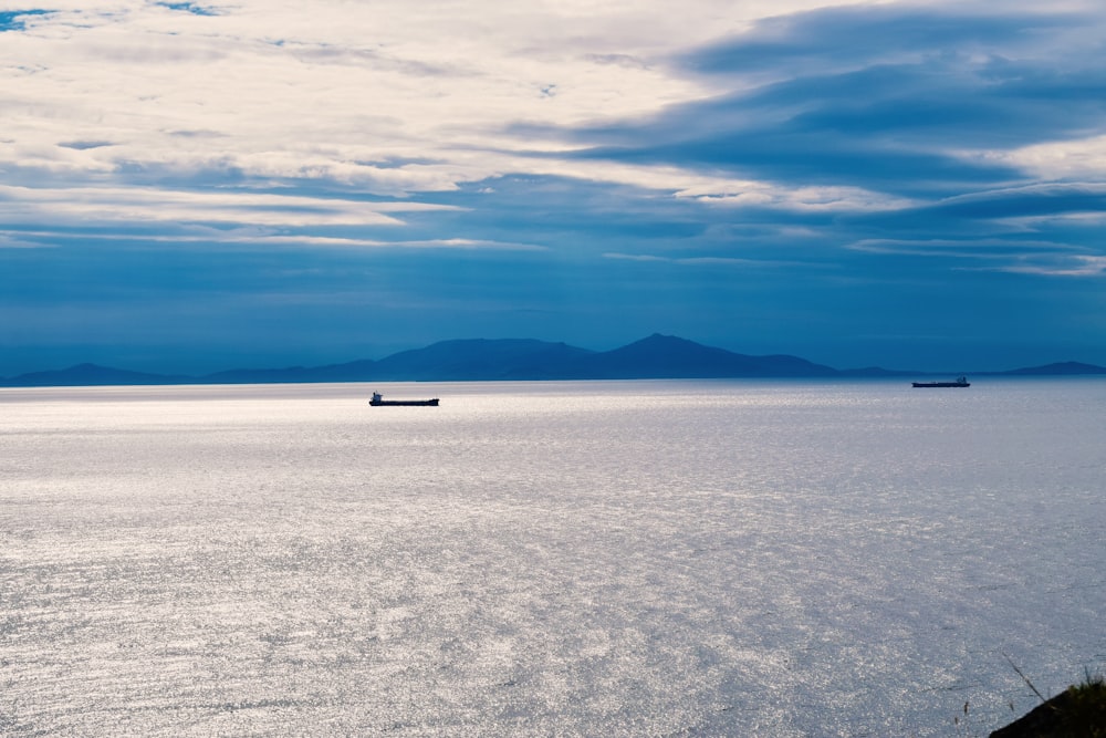 a large body of water surrounded by mountains