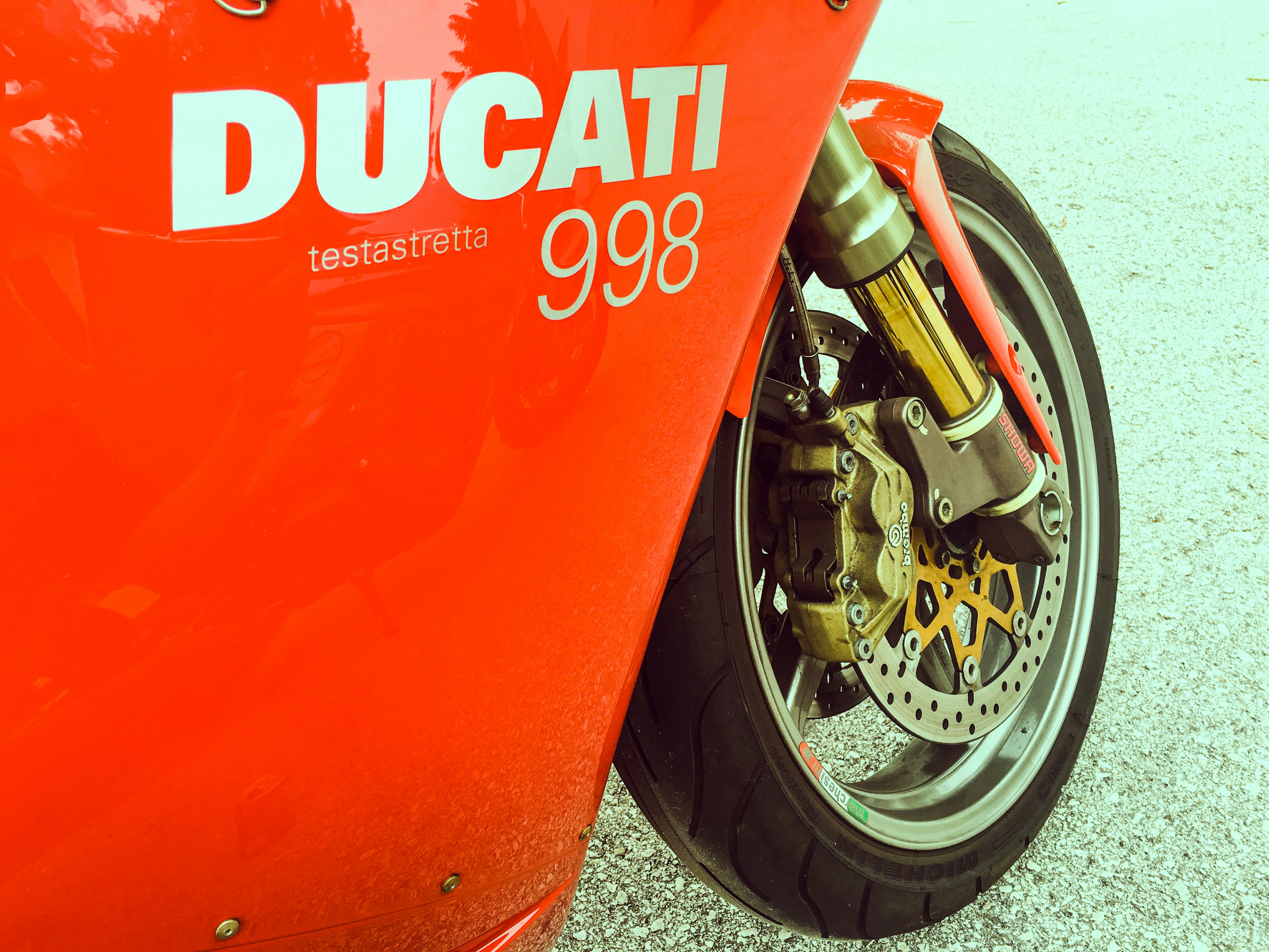 a close up of the front wheel of a motorcycle