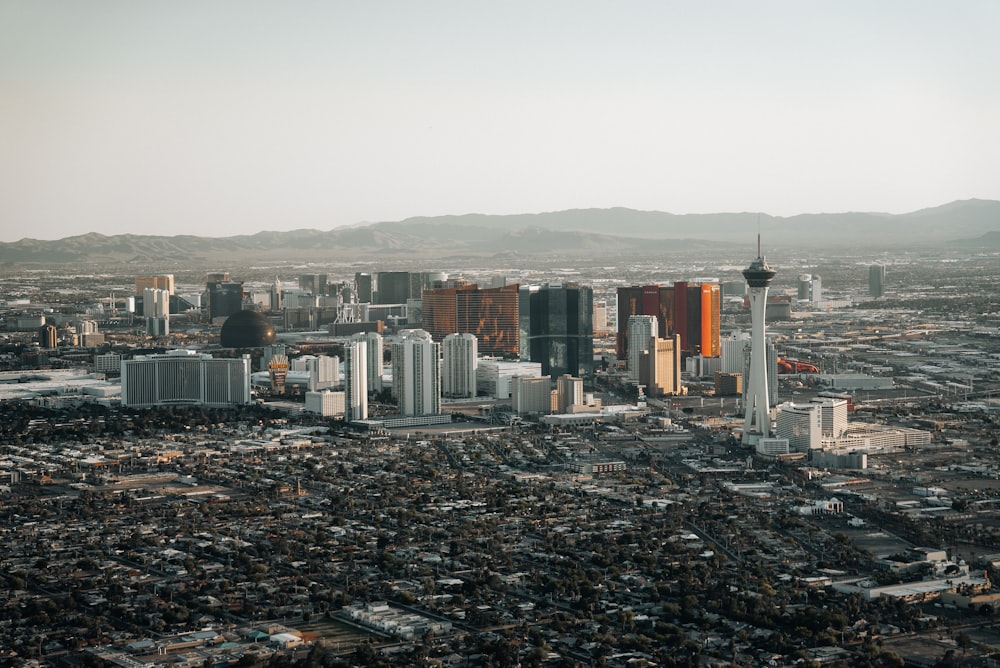 an aerial view of a city with tall buildings