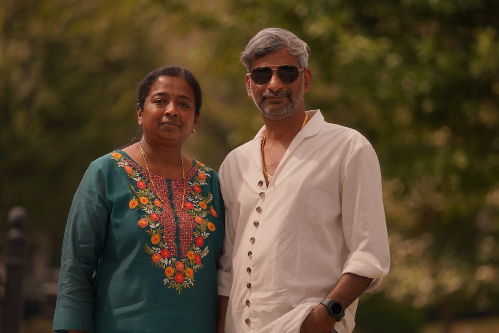 a man and a woman standing next to each other