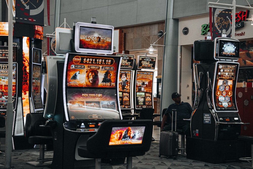 a row of slot machines sitting next to each other