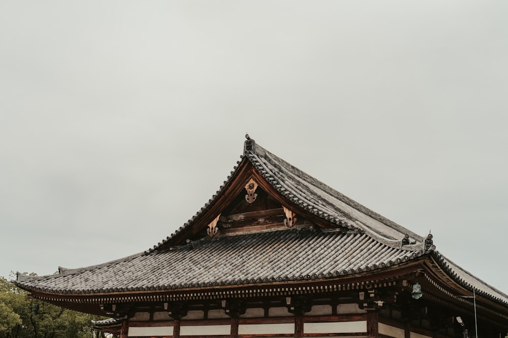 a tall building with a clock on the top of it