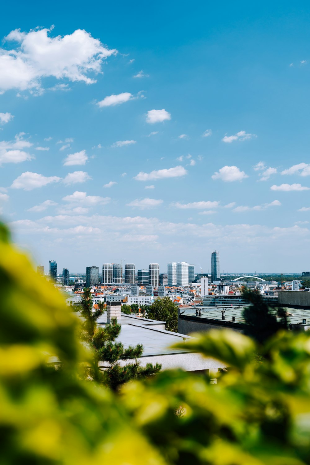 a view of a city from the top of a hill