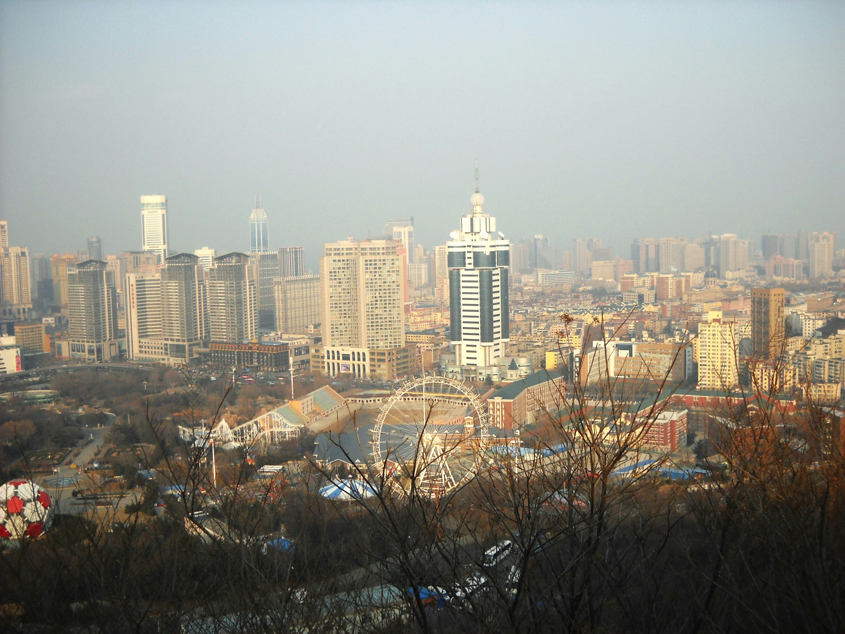 a view of a city with tall buildings