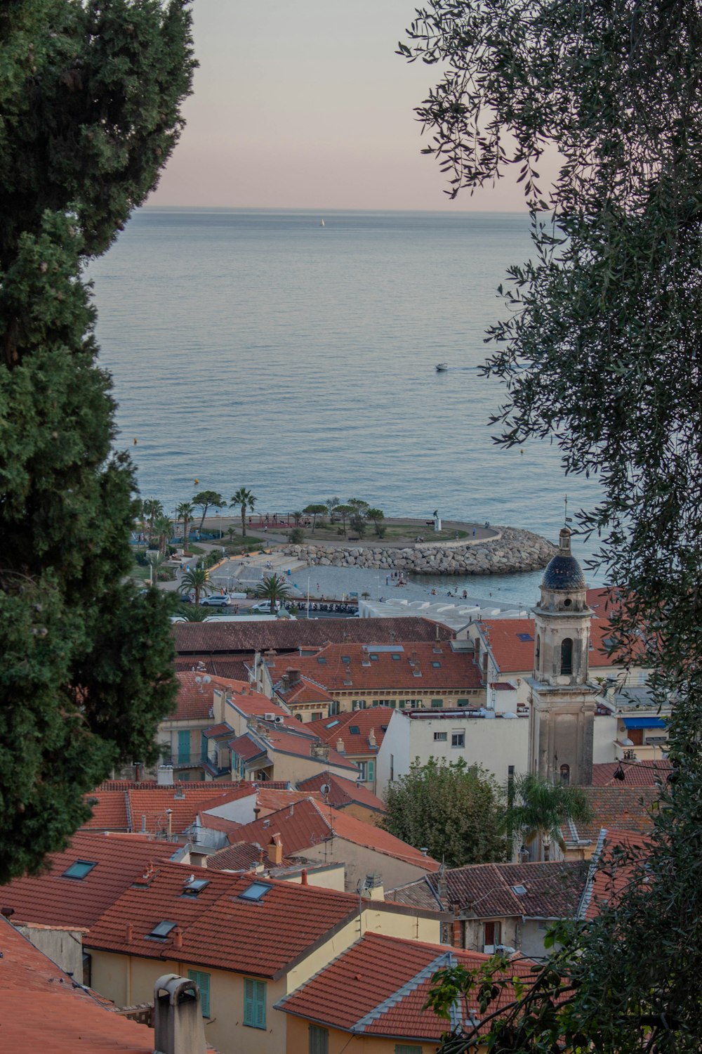 a view of a city with a body of water in the background