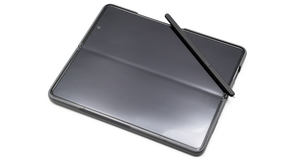 A sleek Samsung tablet with a large screen and stylus.