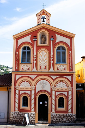 a building with a clock on the top of it