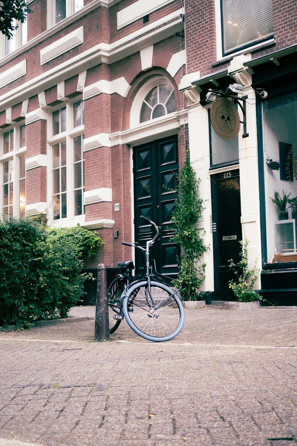 a bicycle parked in front of a building