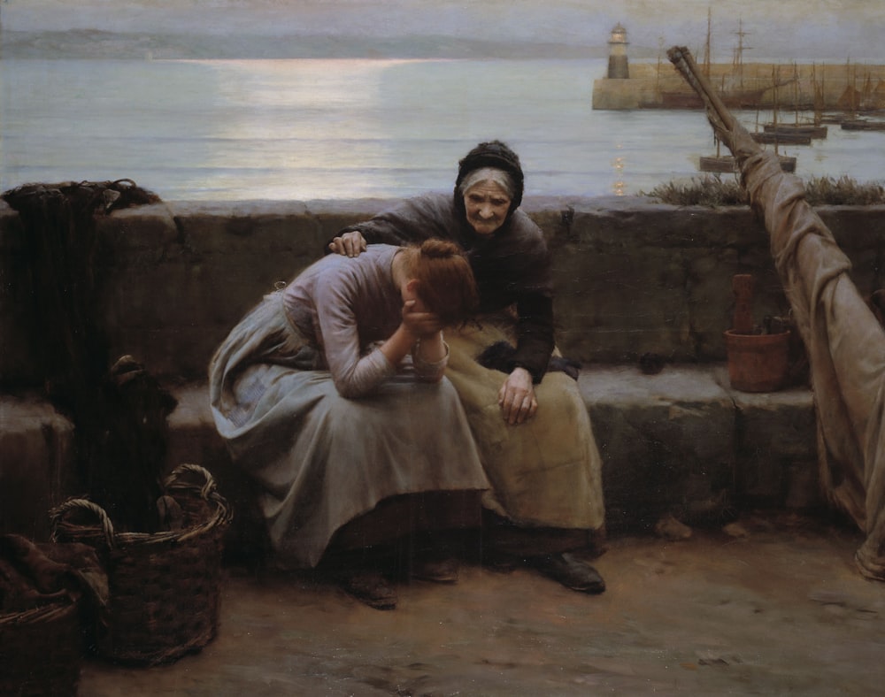 a painting of two women sitting on a wall