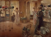 A softly lit room filled with elegant hats displayed on tall stands. Three women are present, with one adjusting a hat in front of a mirror. Another woman holds a hat while standing, and a third sits quietly. The atmosphere is calm and genteel, reminiscent of a past era. The walls and floor have a warm, brown hue, complementing the delicate fabric of the hats.