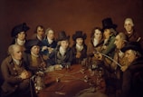 a painting of a group of people sitting around a table