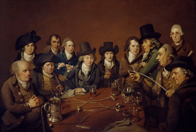 a painting of a group of people sitting around a table