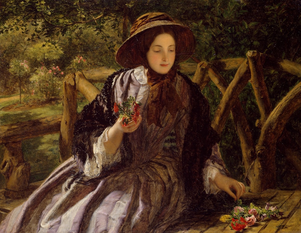 a painting of a woman holding a flower
