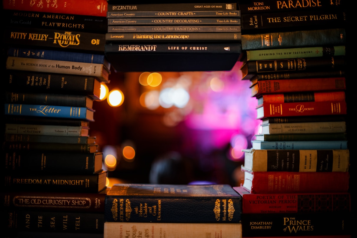 a stack of books sitting on top of each other